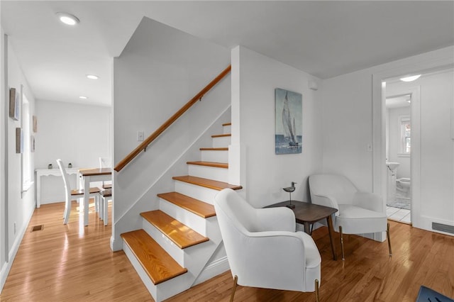 19 Woodsia Rd, Narragansett, RI 02874 - staircase with wood finished floors, recessed lighting, and baseboards