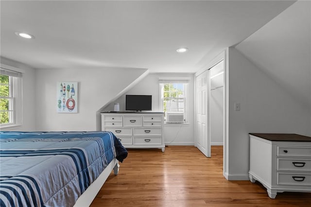 19 Woodsia Rd, Narragansett, RI 02874 - bedroom featuring light wood-style floors, multiple windows, recessed lighting, baseboards, and cooling unit