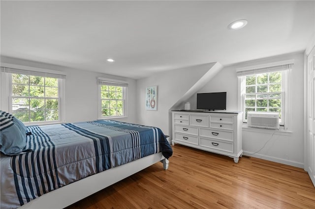 19 Woodsia Rd, Narragansett, RI 02874 - bedroom with multiple windows, light wood-type flooring, cooling unit, recessed lighting, and baseboards