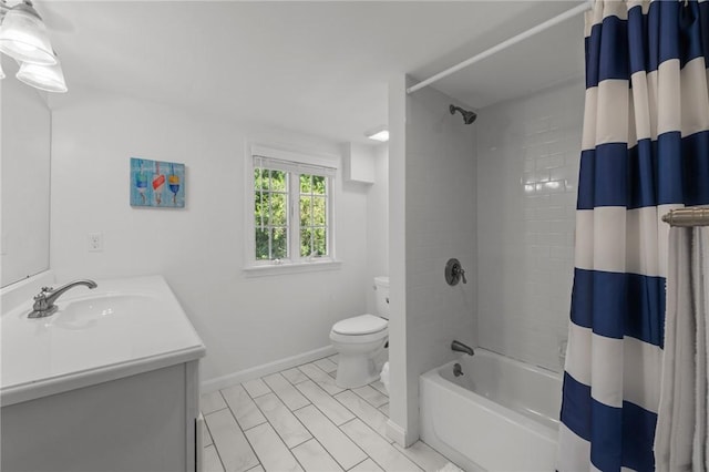 19 Woodsia Rd, Narragansett, RI 02874 - bathroom featuring toilet, vanity, shower / bath combo with shower curtain, and baseboards