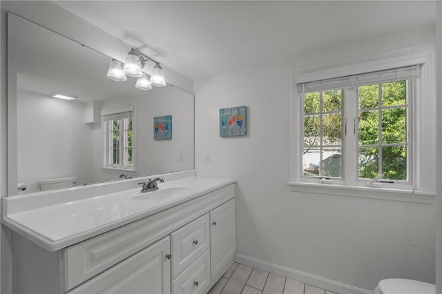 19 Woodsia Rd, Narragansett, RI 02874 - half bath with toilet, vanity, and baseboards