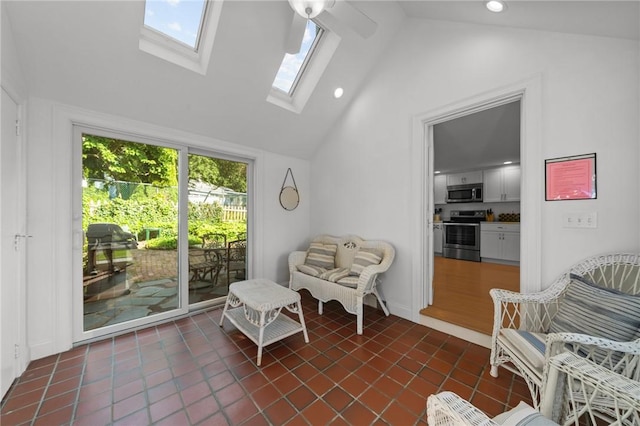19 Woodsia Rd, Narragansett, RI 02874 - living area featuring a skylight, high vaulted ceiling, dark tile patterned flooring, and recessed lighting