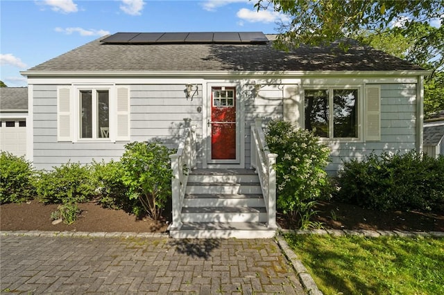 19 Woodsia Rd, Narragansett, RI 02874 - cape cod home with roof mounted solar panels and roof with shingles