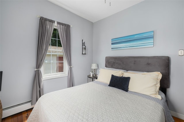 30 Lincoln St, Smithfield, RI 02917 - bedroom featuring a baseboard radiator, wood finished floors, and baseboards