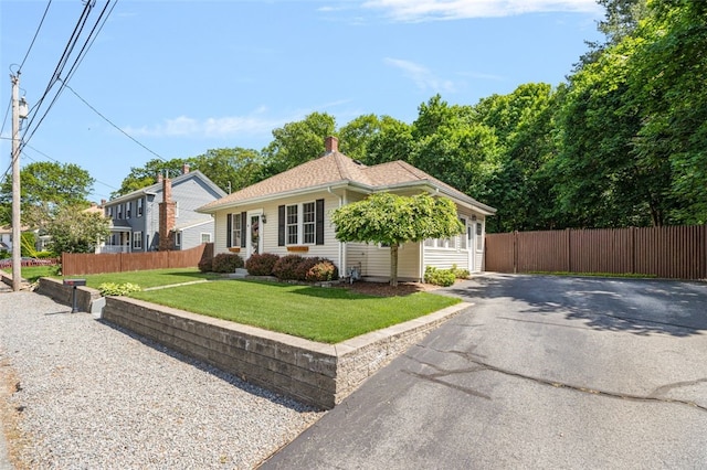 30 Lincoln St, Smithfield, RI 02917 - view of front of property with asphalt driveway and a chimney