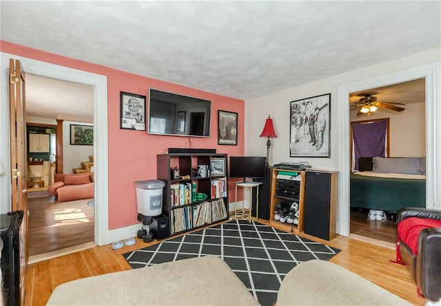 339 Beverage Hill Ave, Pawtucket, RI 02861 - office with wood finished floors, baseboards, and ceiling fan
