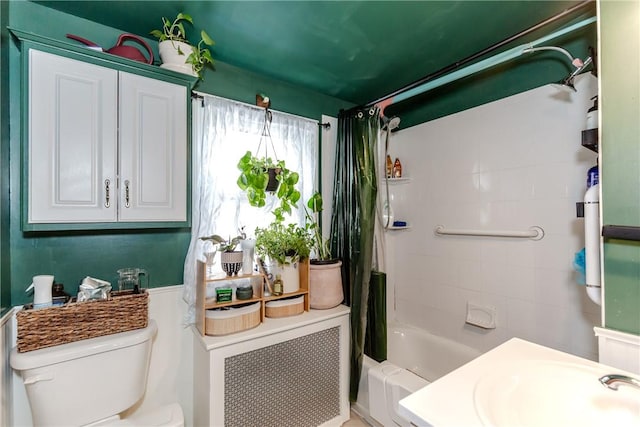 339 Beverage Hill Ave, Pawtucket, RI 02861 - bathroom featuring a sink, toilet, and shower / tub combo with curtain