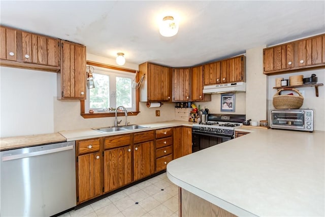 339 Beverage Hill Ave, Pawtucket, RI 02861 - kitchen with dishwasher, range with gas stovetop, a sink, under cabinet range hood, and brown cabinetry