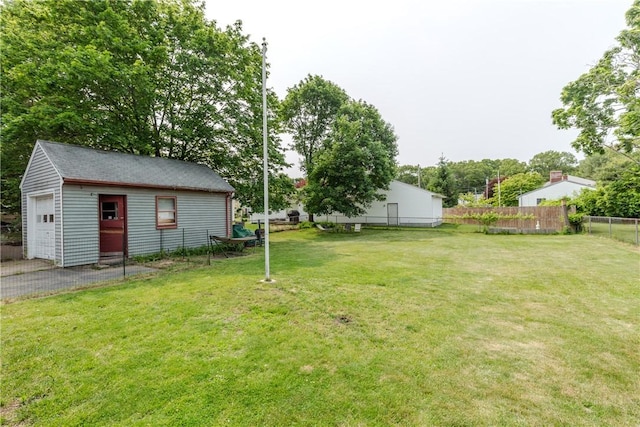 339 Beverage Hill Ave, Pawtucket, RI 02861 - view of yard with an outdoor structure and a detached garage