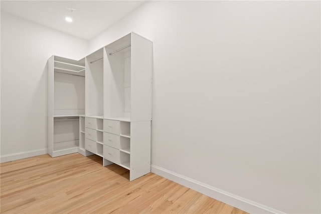 66 Orchard Ave, Johnston, RI 02919 - walk in closet with light wood-style floors