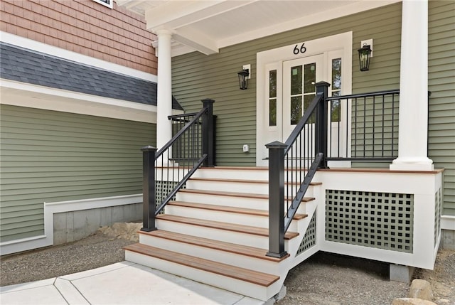 66 Orchard Ave, Johnston, RI 02919 - doorway to property with a shingled roof