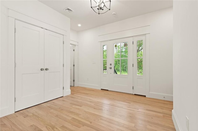 66 Orchard Ave, Johnston, RI 02919 - entryway with light wood-style floors, a chandelier, and recessed lighting