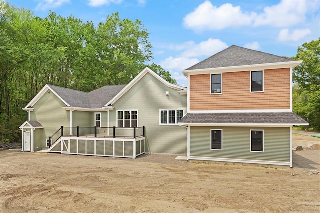 66 Orchard Ave, Johnston, RI 02919 - back of property with roof with shingles and a deck