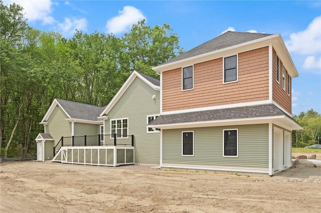 66 Orchard Ave, Johnston, RI 02919 - rear view of house featuring a shingled roof