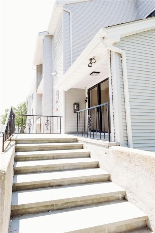 66 Girard Ave Unit 106, Newport, RI 02840 - doorway to property featuring a porch