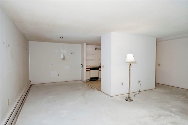 66 Girard Ave Unit 106, Newport, RI 02840 - spare room featuring a baseboard radiator and unfinished concrete floors