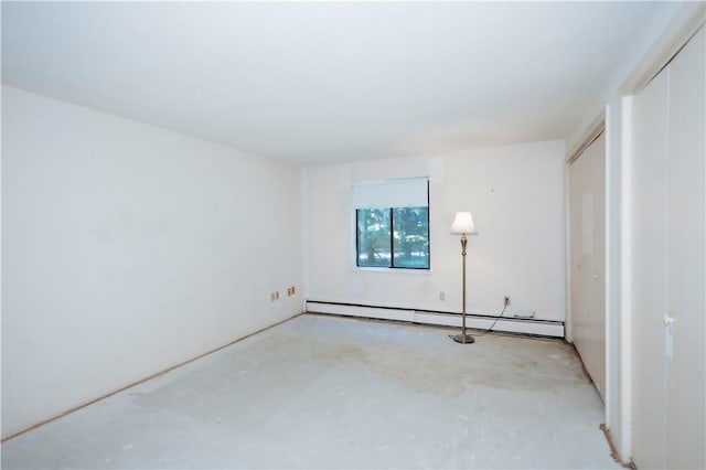 66 Girard Ave Unit 106, Newport, RI 02840 - unfurnished room featuring a baseboard radiator and unfinished concrete floors