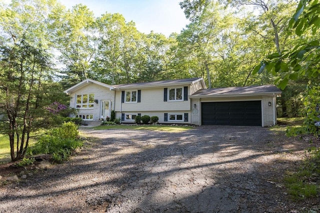 38 Williams Rd, Smithfield, RI 02917 - view of front of property featuring driveway and a garage