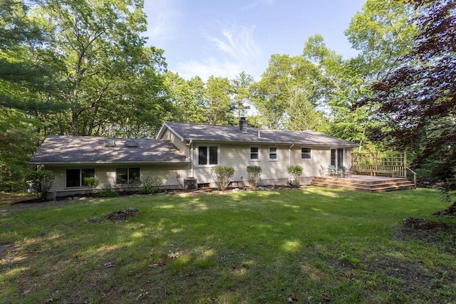 38 Williams Rd, Smithfield, RI 02917 - back of property with a wooden deck and a yard