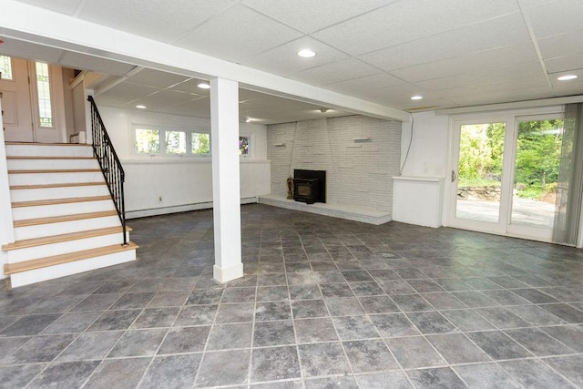 38 Williams Rd, Smithfield, RI 02917 - unfurnished living room featuring stairway, recessed lighting, a paneled ceiling, and a baseboard heating unit