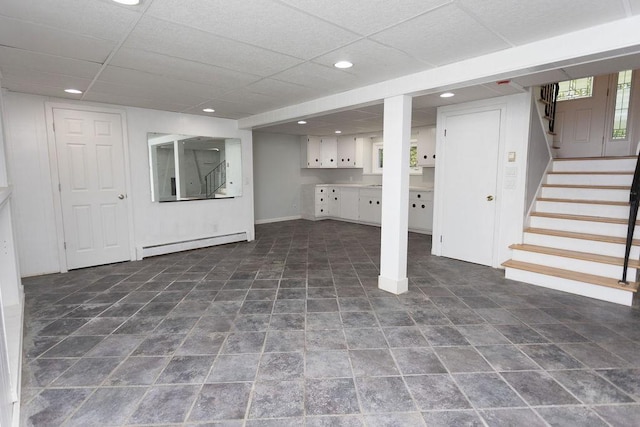 38 Williams Rd, Smithfield, RI 02917 - basement with baseboard heating, stairs, recessed lighting, baseboards, and a drop ceiling