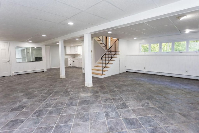 38 Williams Rd, Smithfield, RI 02917 - below grade area featuring baseboard heating, stairway, recessed lighting, and a drop ceiling