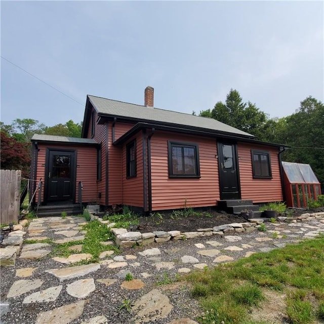 199 Plainfield Pike, Scituate, RI 02857 - view of front of property featuring a chimney and entry steps