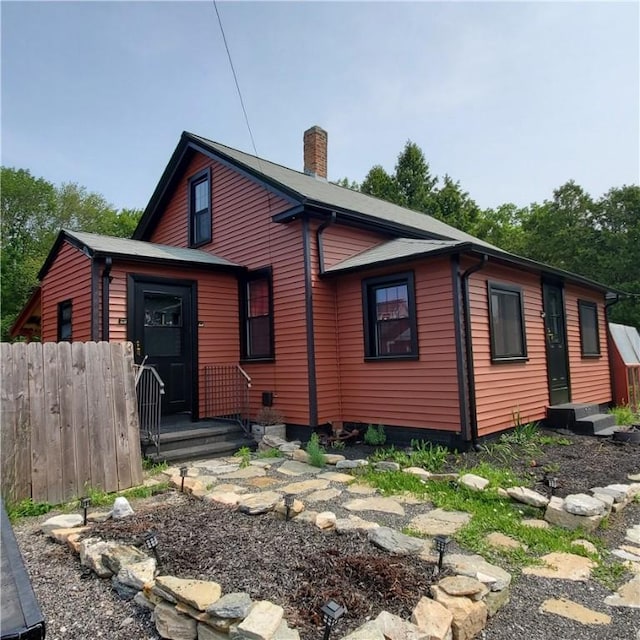 199 Plainfield Pike, Scituate, RI 02857 - back of property with a chimney