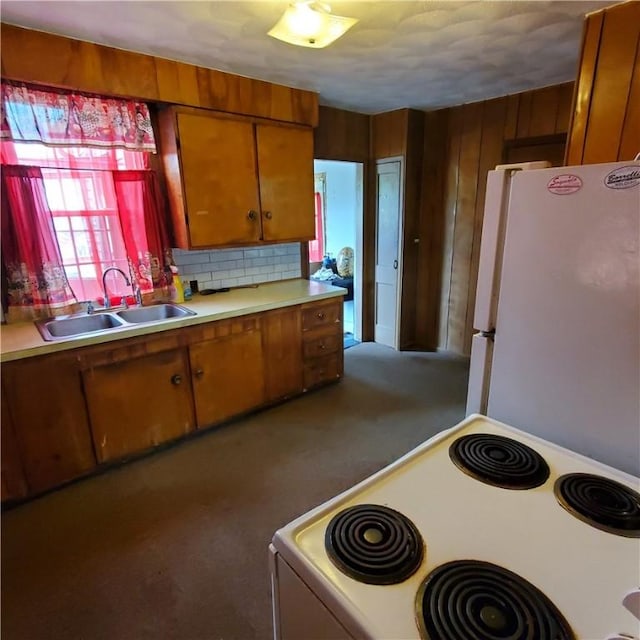 199 Plainfield Pike, Scituate, RI 02857 - kitchen with white appliances, a sink, light countertops, and brown cabinets