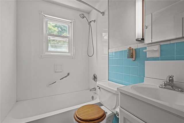 16 King Rd, Middletown, RI 02842 - full bathroom featuring vanity,  shower combination, toilet, and tile walls