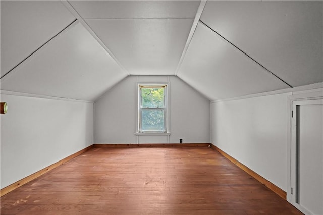 16 King Rd, Middletown, RI 02842 - additional living space featuring hardwood / wood-style floors, vaulted ceiling, and baseboards