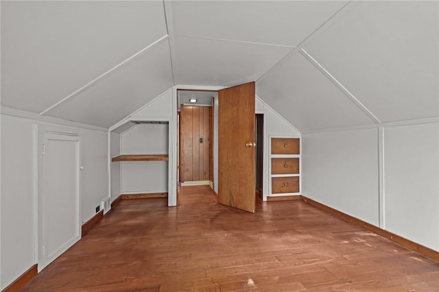 16 King Rd, Middletown, RI 02842 - additional living space featuring vaulted ceiling, wood finished floors, and baseboards