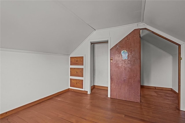 16 King Rd, Middletown, RI 02842 - additional living space with lofted ceiling, wood finished floors, and baseboards