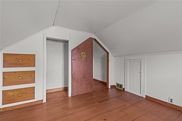 16 King Rd, Middletown, RI 02842 - bonus room featuring wood finished floors, vaulted ceiling, and baseboards