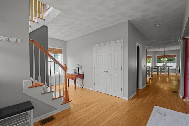 510 Westmoreland Ln, North Kingstown, RI 02874 - foyer entrance featuring stairway, hardwood / wood-style floors, and baseboards