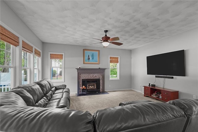 510 Westmoreland Ln, North Kingstown, RI 02874 - carpeted living room with a ceiling fan, baseboards, and a textured ceiling