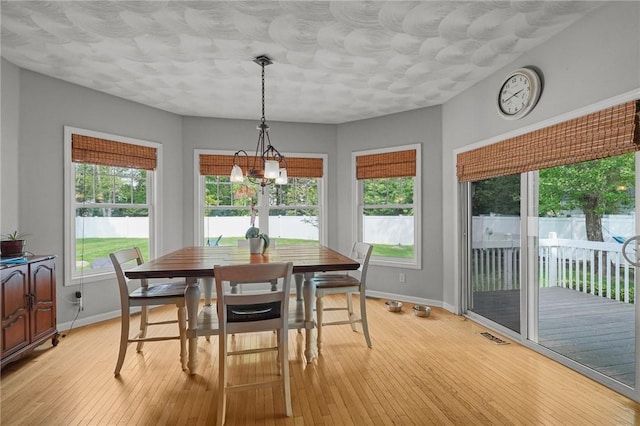 510 Westmoreland Ln, North Kingstown, RI 02874 - dining room featuring baseboards and light wood-type flooring