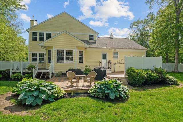 510 Westmoreland Ln, North Kingstown, RI 02874 - back of property featuring a chimney and a deck