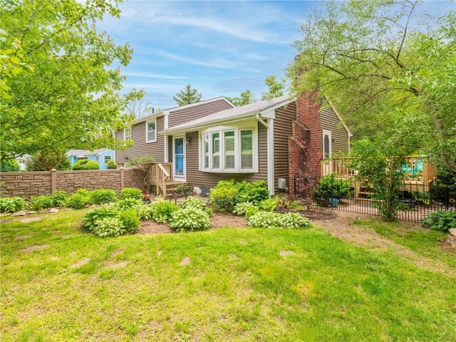 860 Centerville Rd, Warwick, RI 02886 - back of property featuring a chimney