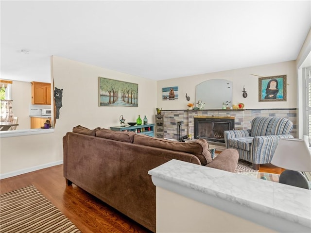 860 Centerville Rd, Warwick, RI 02886 - living area featuring dark wood-type flooring and a brick fireplace