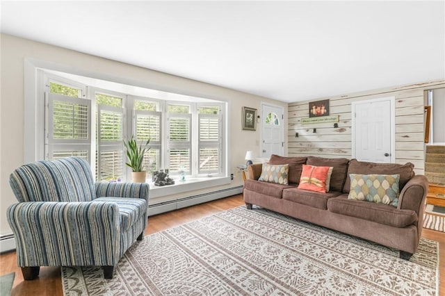 860 Centerville Rd, Warwick, RI 02886 - living area with a baseboard radiator, wood finished floors, and wood walls