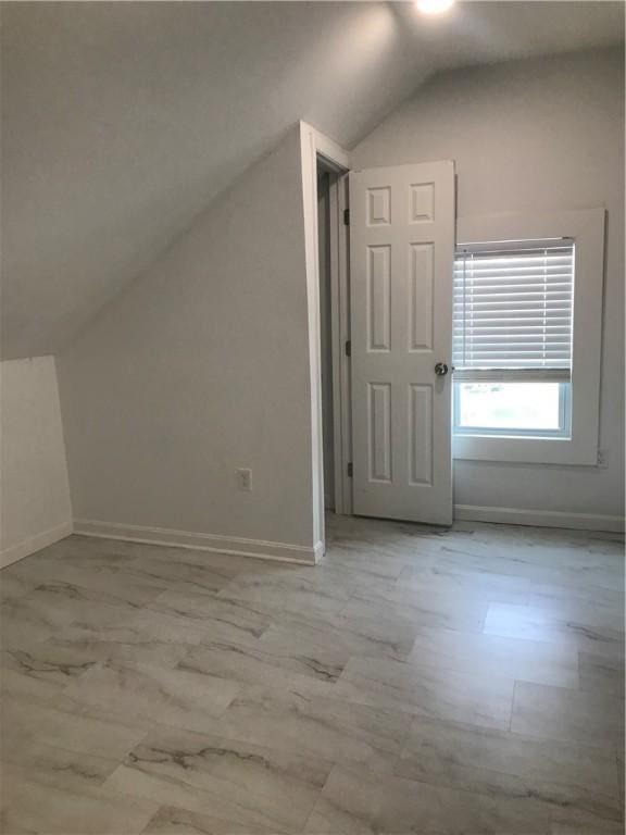 72 Mercy St, Providence, RI 02909 - bonus room featuring vaulted ceiling and marble look tiles