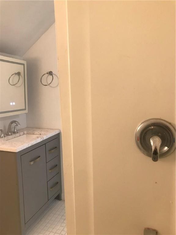 72 Mercy St, Providence, RI 02909 - bathroom with vanity and lofted ceiling