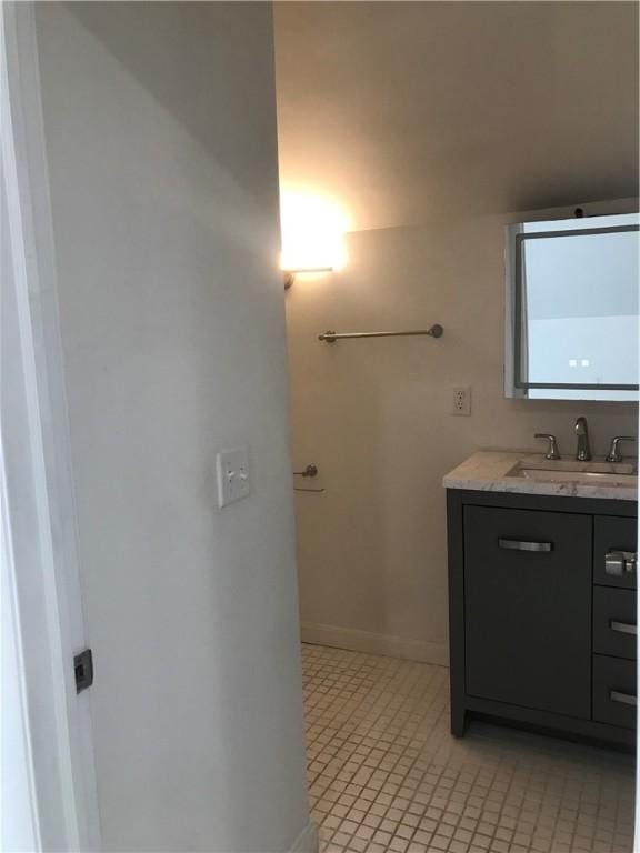 72 Mercy St, Providence, RI 02909 - bathroom with vanity and tile patterned flooring