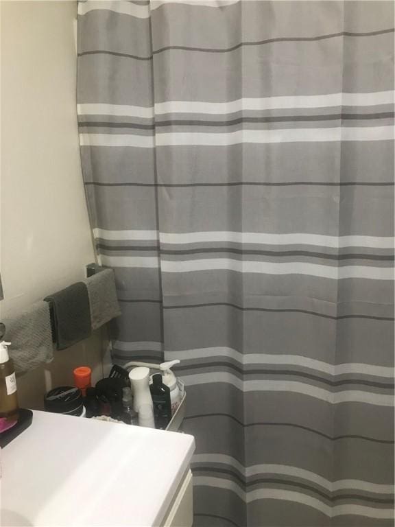 72 Mercy St, Providence, RI 02909 - bathroom featuring vanity and a shower with curtain
