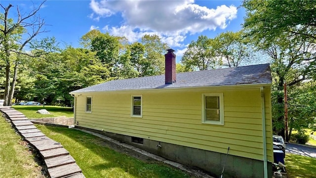 106 Leigh Rd, Cumberland, RI 02864 - view of side of property with a chimney and a yard