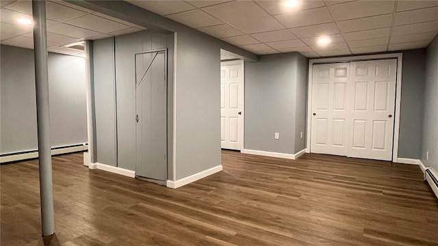 106 Leigh Rd, Cumberland, RI 02864 - finished below grade area featuring a paneled ceiling, wood finished floors, and baseboards