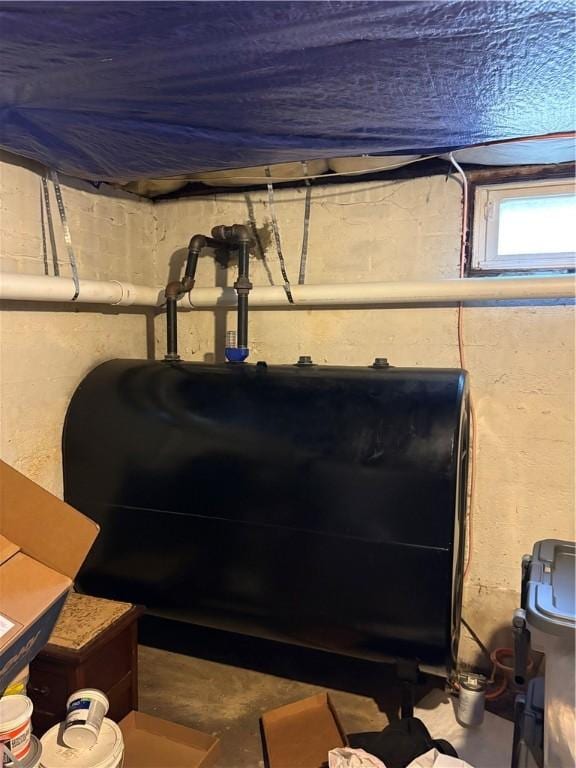 202 Jenckes St, Woonsocket, RI 02895 - basement view of heating fuel and concrete flooring