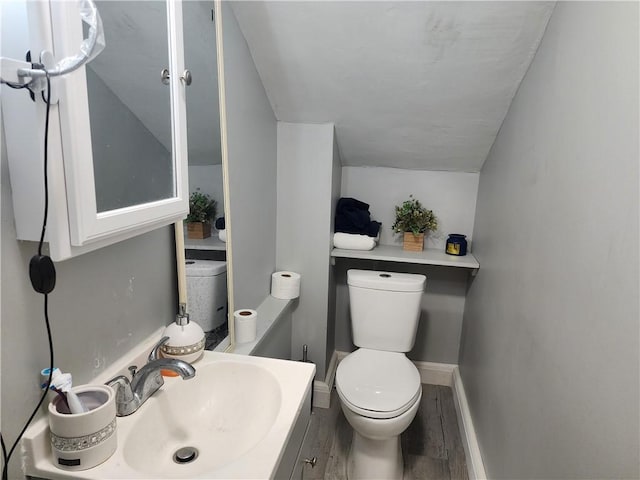 27 Unit St, Providence, RI 02909 - bathroom featuring toilet, wood finished floors, vanity, and baseboards
