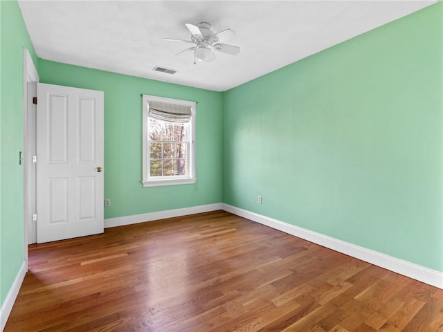 44 Azalea Ave, Exeter, RI 02822 - unfurnished bedroom featuring baseboards, wood finished floors, and ceiling fan